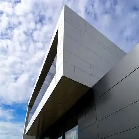 Modern aluminum composite panel installation on a commercial building facade