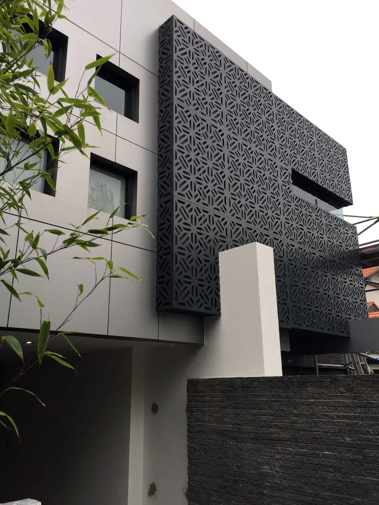 Professional aluminum composite panel installation on commercial building